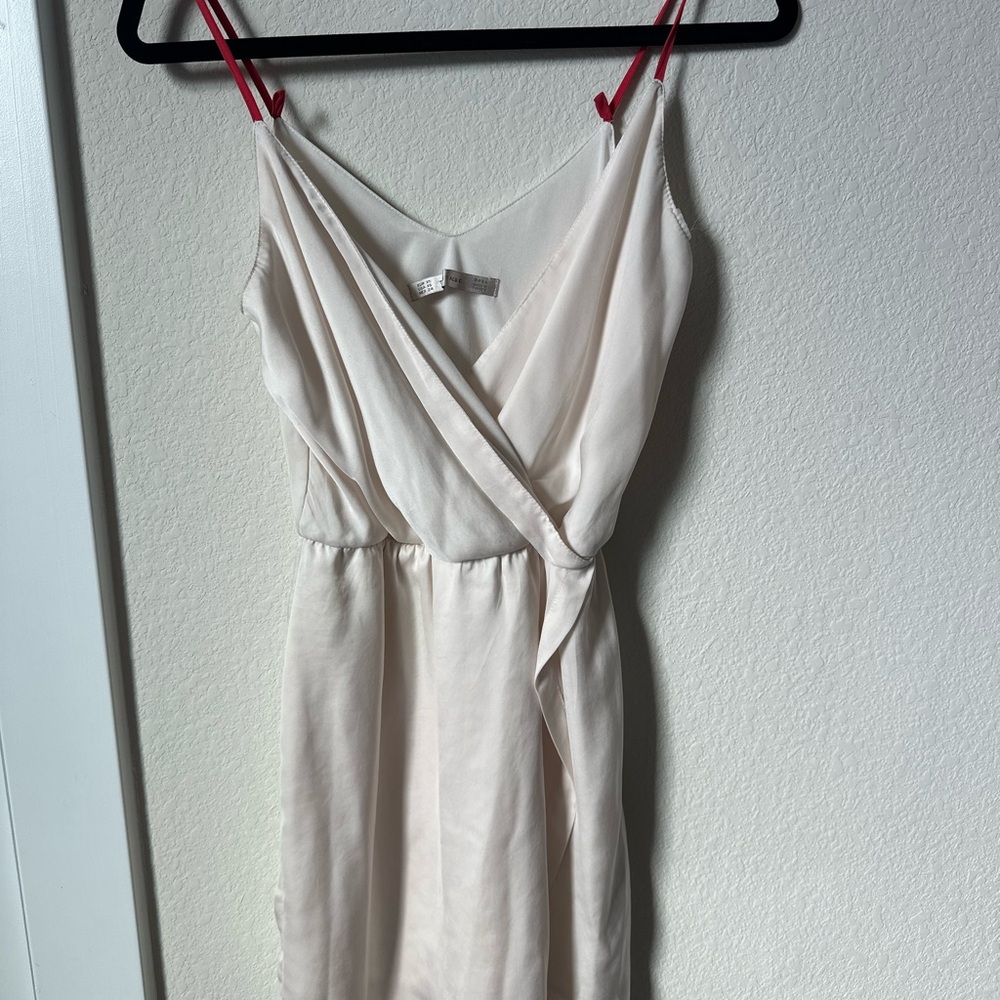 Elegant Cream Dress with Red Straps